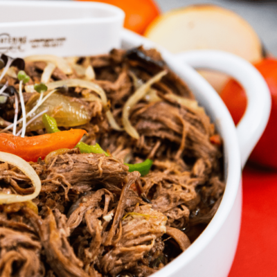 Latin Ropa Vieja (Tender Shredded Beef simmered in tomatoes, herbs, peppers & spices)